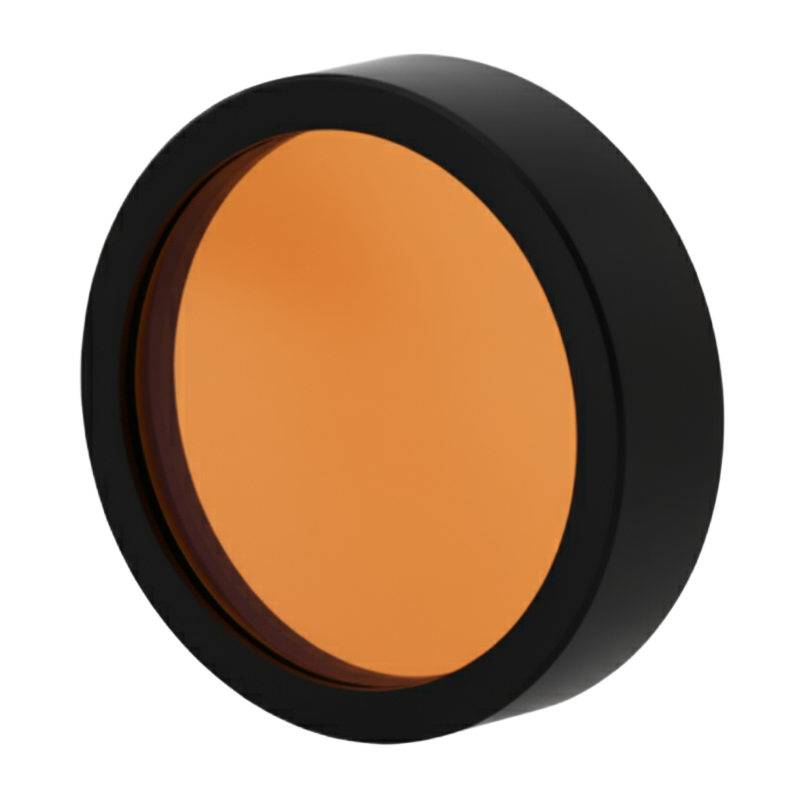 Round makeup compact with orange powder and black lid on a white background