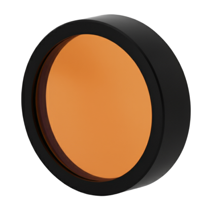 Round makeup compact with orange powder and black lid on a white background